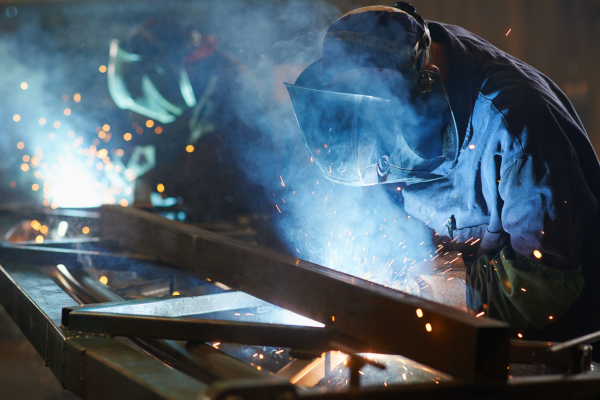 3 - Edwards Law An image showing an immigrant working in a welding setting. They were able to come work in Canada with their skillset based on the Super Visa application process.