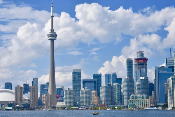 7 - Edwards Law An image showing the skyline of Toronto, where many workers contribute to the local economy by way of their Visitor Visa admission.