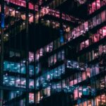 A photo of windows outside an office building where executives who utilized the L-1A visa work.