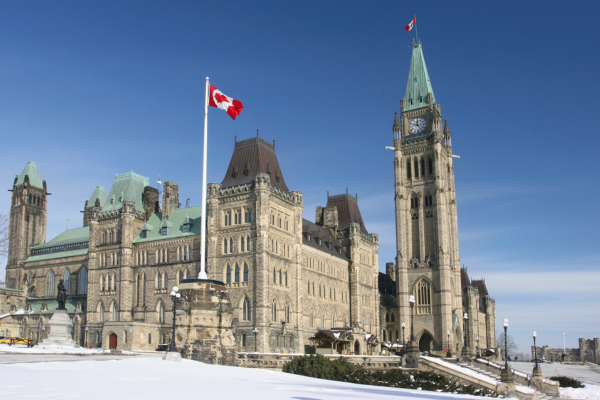 u 2 - Edwards Law An image of Canada's Parliament building in Ottawa to show the Canadian Naturalization step in becoming a full member of Canadian society.
